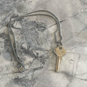 Key necklace with ‘Fearless’